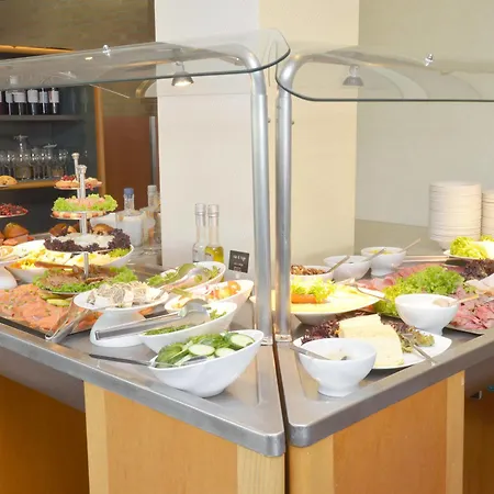 酒店 斯海尔托亨博斯弗莱彻餐厅酒店